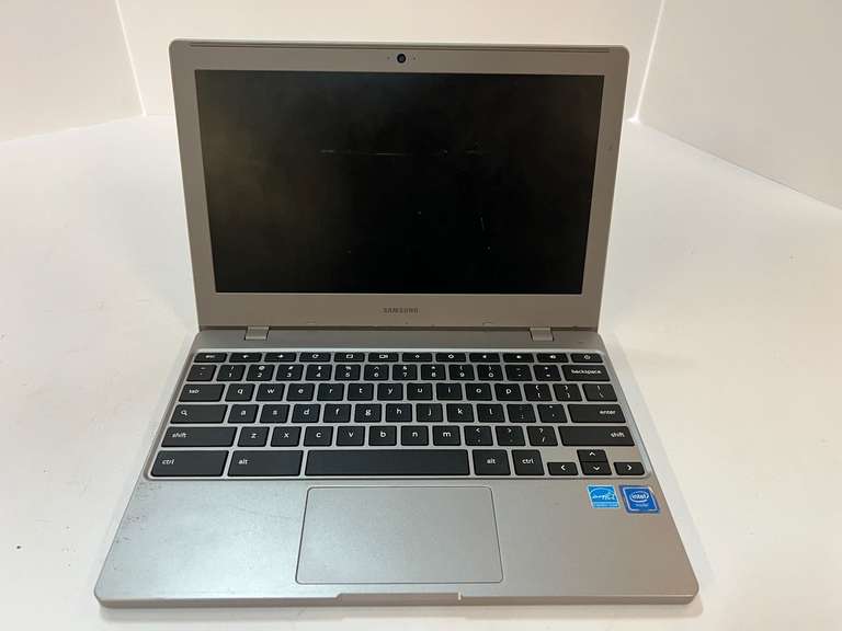 Samsung laptop, no cords, working condition unknown, see pictures for details. image