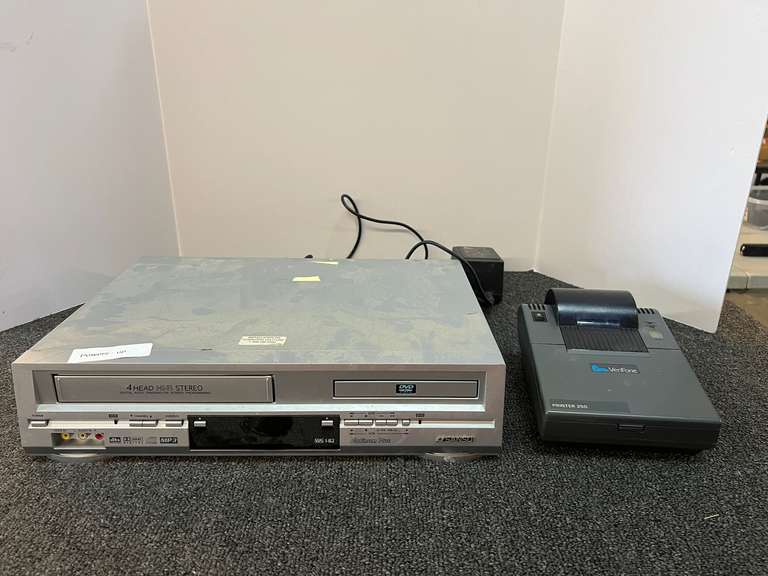 Sansui VRDVD4000 series DVD/VHS combo player, powers up, working condition unknown. Also includes a VeriFone printer 250, working condition unknown, see pictures for details. image
