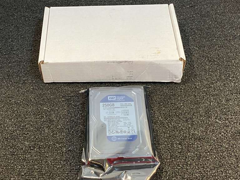 Western Digital Caviar Blue 250GB PATA/IDE hard drive, model number WD2500AAJB. See pictures for details. image