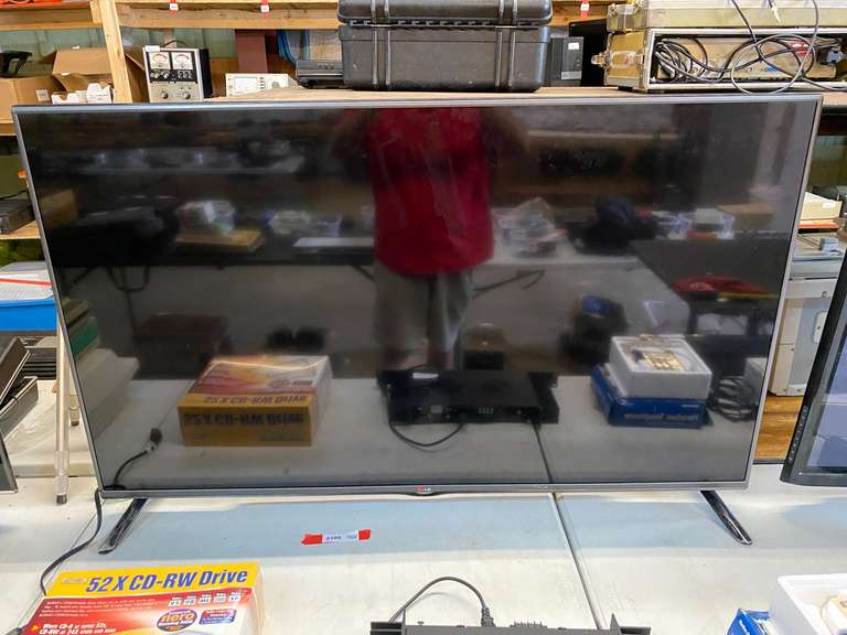 LG 55” TV, does not power up, see pictures for details. image