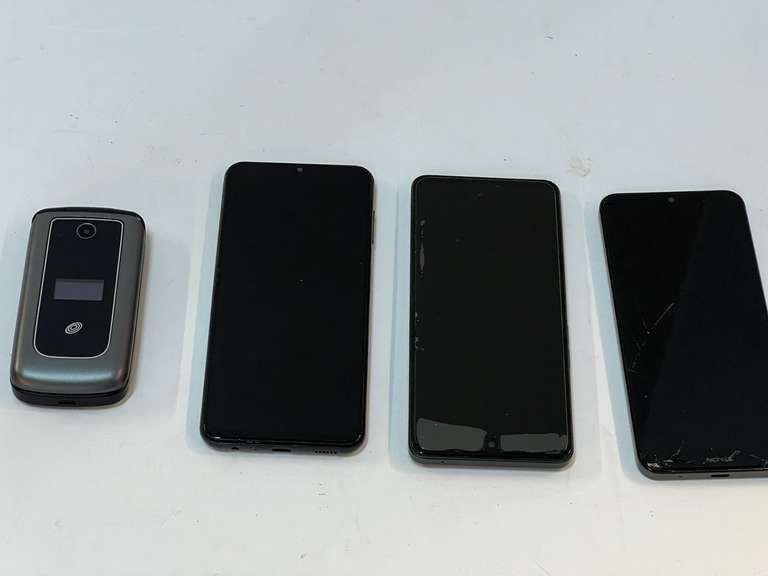 Cell phone assortment, tub is not included, see pictures for details. image
