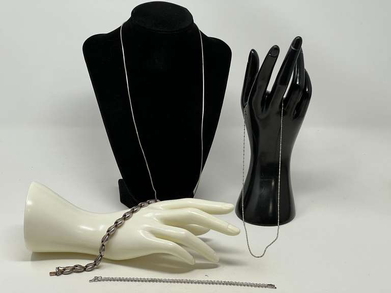 Ladies fashion jewelry, four pieces to include bracelets and silver chains, all four pieces are stamped 925, includes a beautiful tennis bracelet, see pictures for details. image