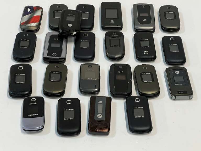 Large assortment of flip phones, tub is not included, see pictures for details. image