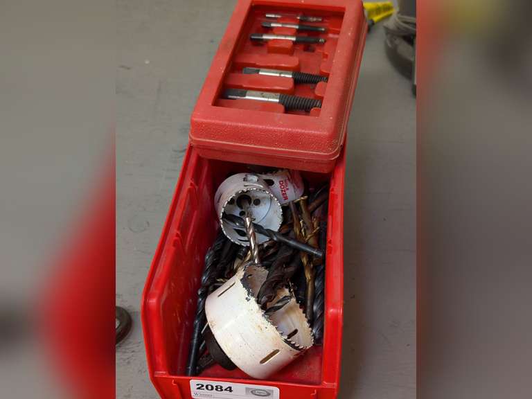 STACKABLE STORAGE BIN FILLED WITH DRILL BITS, HOLE SAWS, AND MORE image