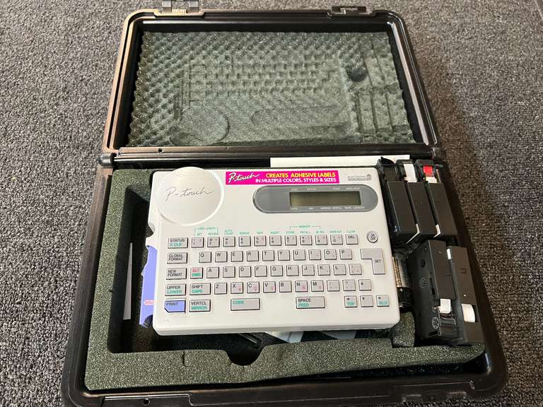 P-Touch label maker, comes with carrying/storage case, working condition unknown, see pictures for details. image
