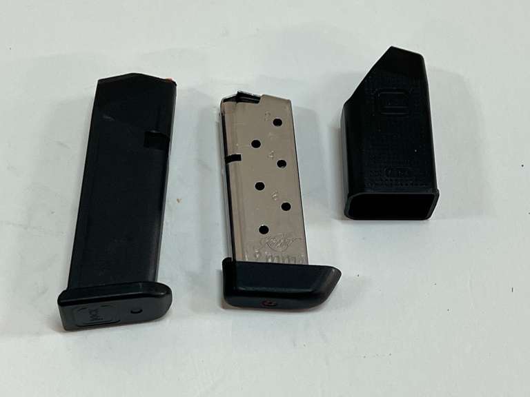 Glock and 9 mm magazines, also includes a Glock speed loader, see pictures for details. image
