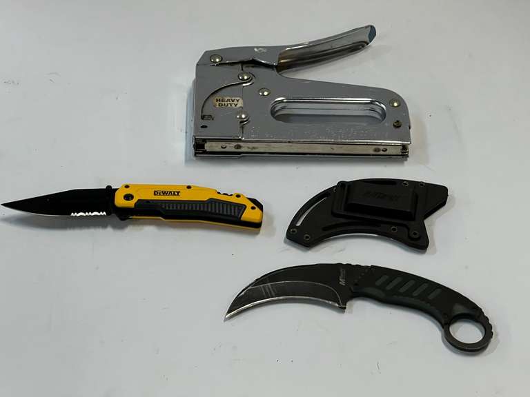MTech curved blade fixed knife, DeWalt pocket knife, and Arrow heavy duty stapler, see pictures for details. image