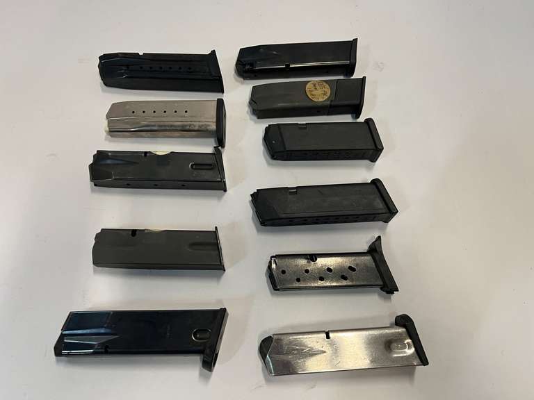 Large assortment of magazines to include Glock, Beretta 9MM, Pro Mag, Smith & Wesson, and more. 11 pieces, see pictures for details. image