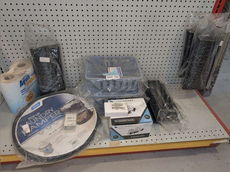 ASSORTED RV PARTS AND ACCESSORIES INCLUDING FRIDGE HOSE DRAIN PLUG, POP-UP LAUNDRY HAMPER, RV THERMOSTAT, DURA FAUCET, AND MORE image