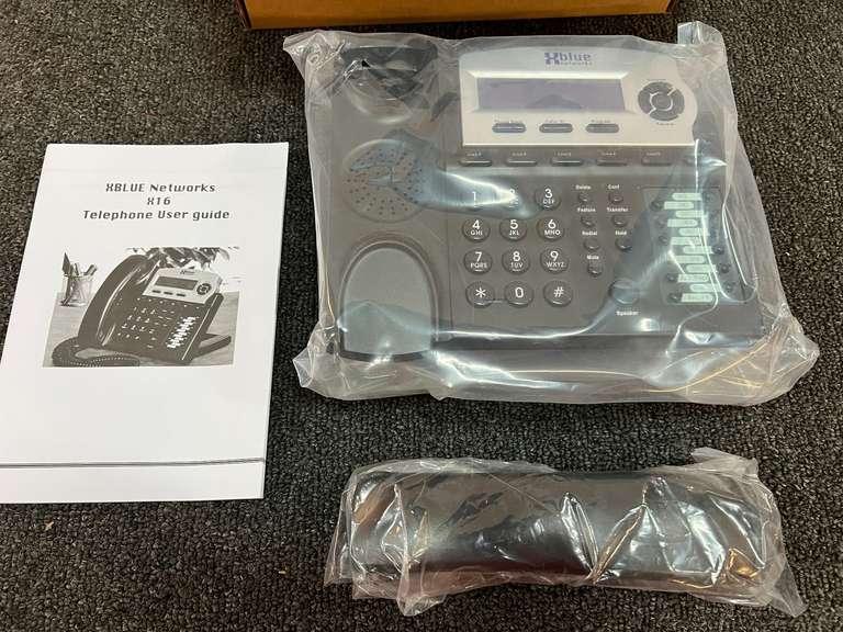 XBlue X16 office telephone, still new in the box, see pictures for details. image