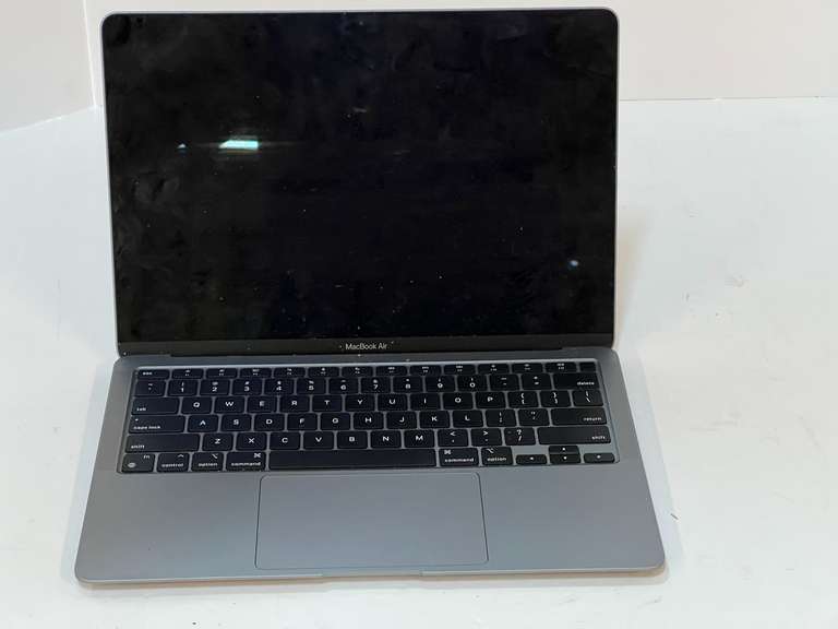 MacBook Air laptop, no cords, working condition unknown, see pictures for details. image