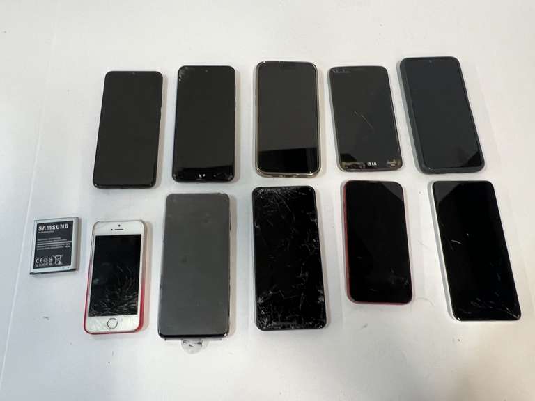 Cell phone assortment, some with cracked screens, tub is not included, see pictures for details. image