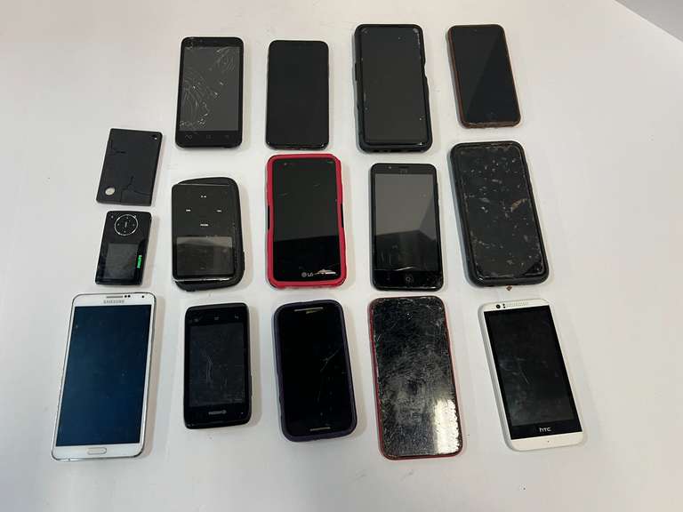 Large assortment of cell phones, some with cracked screens, tub is not included, see pictures for details. image