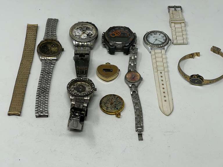 Assorted ladies and men’s watches, some with no bands, or can be used for parts. See pictures for details. image