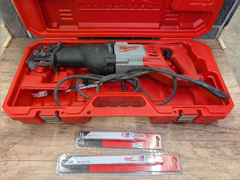 MILWAUKEE SAWZALL RECIPROCATING SAW WITH CASE AND NEW IN PACKAGE BLADES image