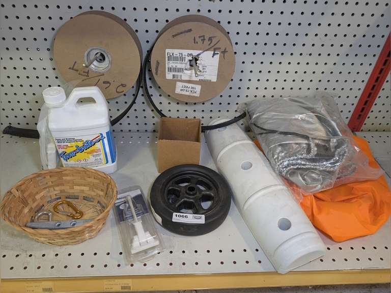 ALL ITEMS IN LOW SHELF AREA MARKED 1066 INCLUDING WATERPROOF BAGS, BULK WEB STRAPPING, TOON BRITE ALUMINUM CLEANER, TRAILER JACK WHEEL, AND MORE image