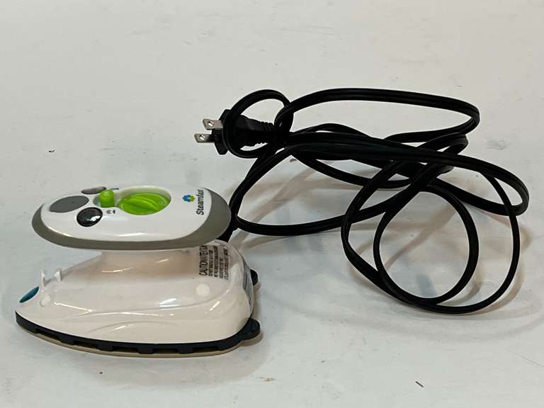 Steamfast travel steam iron, powers up, see pictures for details. image