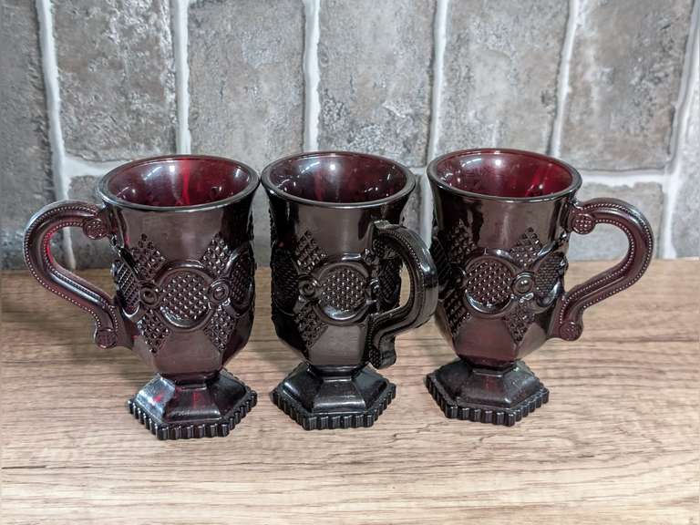 THREE VINTAGE AVON 1876 CAPE COD COLLECTION RUBY RED GLASS PEDESTAL MUGS image