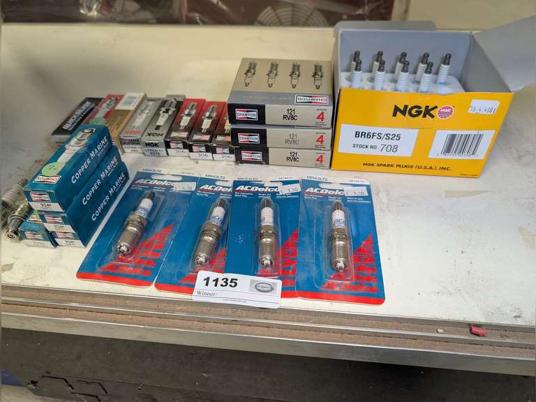 ALL SPARK PLUGS ON COUNTER SHELF MARKED 1135 image