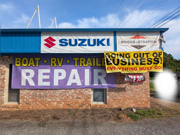 ALL VINYL SIGNAGE ON LEFT SIDE OF BUILDING image