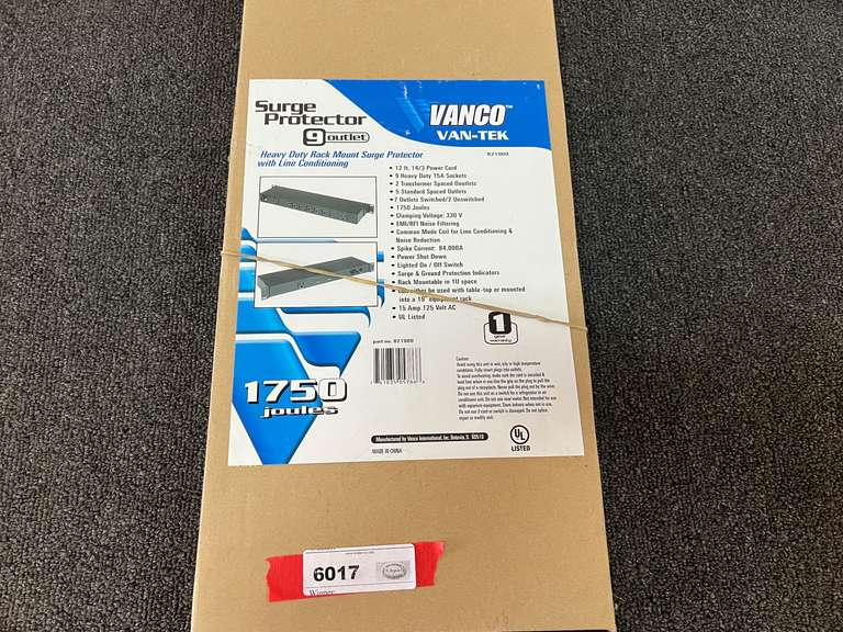 Nine outlet surge protector, still new in the box, see pictures for details. image