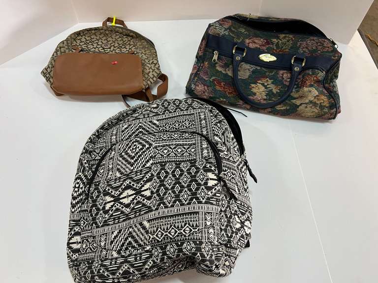 Two backpacks, and ladies handbag, see pictures for details. image