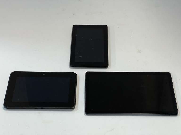 Amazon, Kindle, and Samsung tablets. One has a cracked screen, working condition unknown, no cords, see pictures for details. image