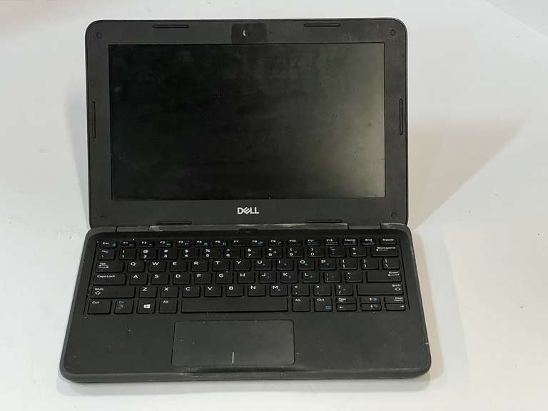 Small Dell laptop, comes with slip cover, working condition unknown, see pictures for details. image