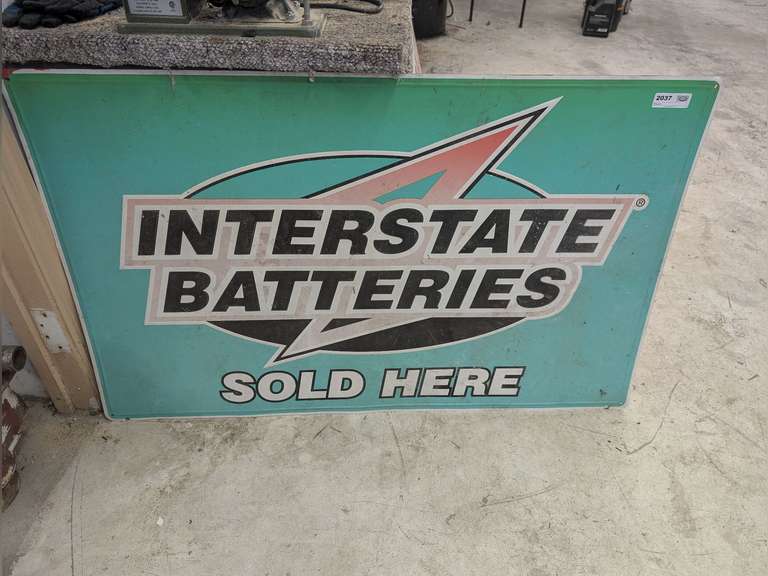 METAL INTERSTATE BATTERIES SOLD HERE SIGN image