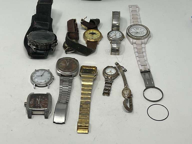 Assorted ladies and men’s watches, some with no bands, or can be used for parts. See pictures for details. image
