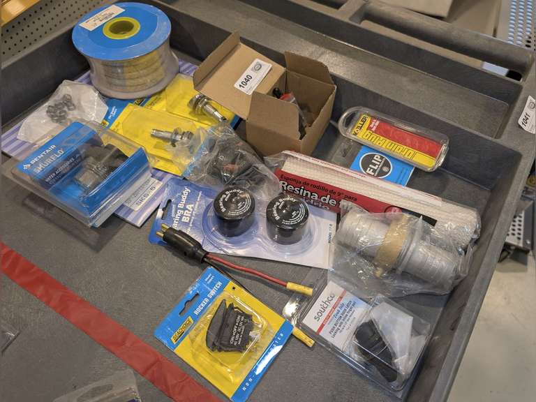 ASSORTED MARINE PARTS INCLUDING BEARING BUDDY CAPS, ELECTRICAL SWITCHES, PLUG, GAS TANK VENTS, AND MORE image