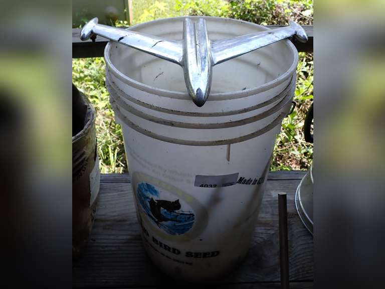Assorted Vehicle Emblems in Bucket image
