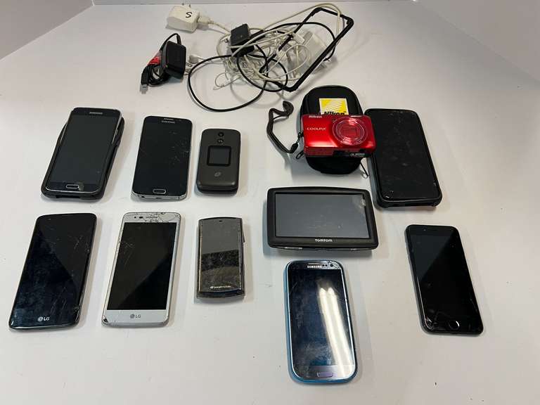 Cell phone assortment, some with cracked screens, tub is not included, see pictures for details. image