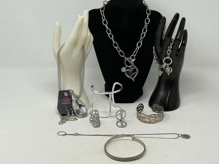 Ladies Silvertone fashion jewelry to include bracelets, necklaces, and fashion ring. See pictures for details. image