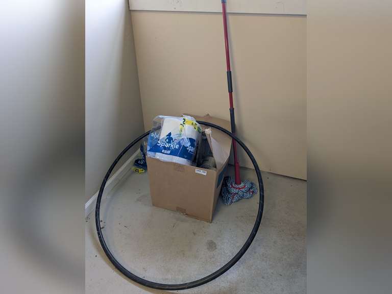 LARGE BOX OF BATHROOM TISSUE, MOP, AND MORE IN CORNER MARKED 1222 image