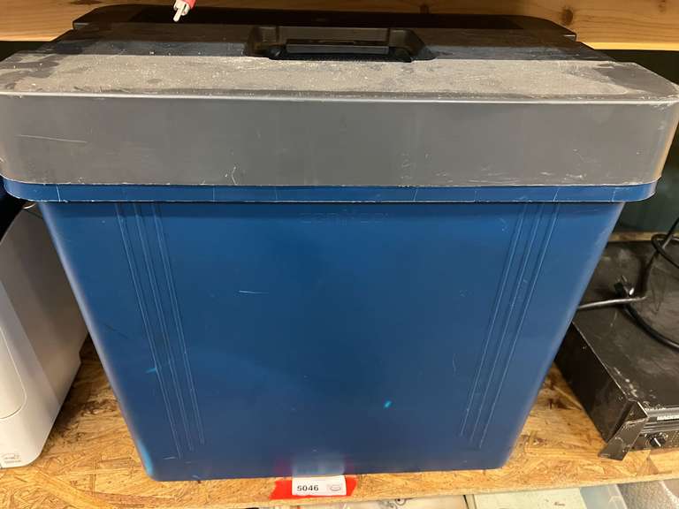 Storage box of assorted hand tools, includes hand saw, caulk gun, Black & Decker electric drill, assorted screwdrivers, and more. See pictures for details. image