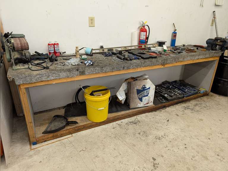 ALL ITEMS ON SHOP COUNTER AND BENEATH INCLUDING CENTRAL MACHINERY BELT SANDER, LARGE BENCH VISE, TOOLS, SHIELDS MARINE HOSE, AND MORE image