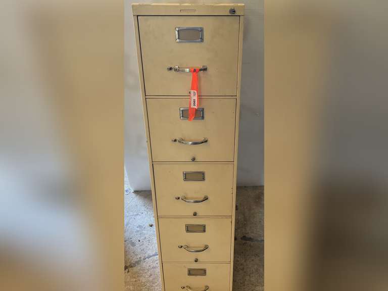 Metal five drawer filing cabinet, see pictures for details. image