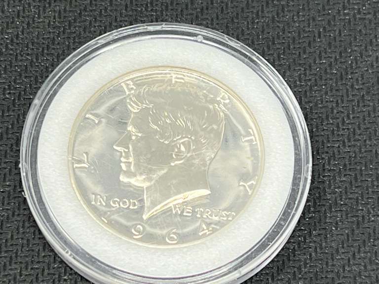 1964 Kennedy half dollar, in protective case, believed to be uncirculated, see pictures for details. image