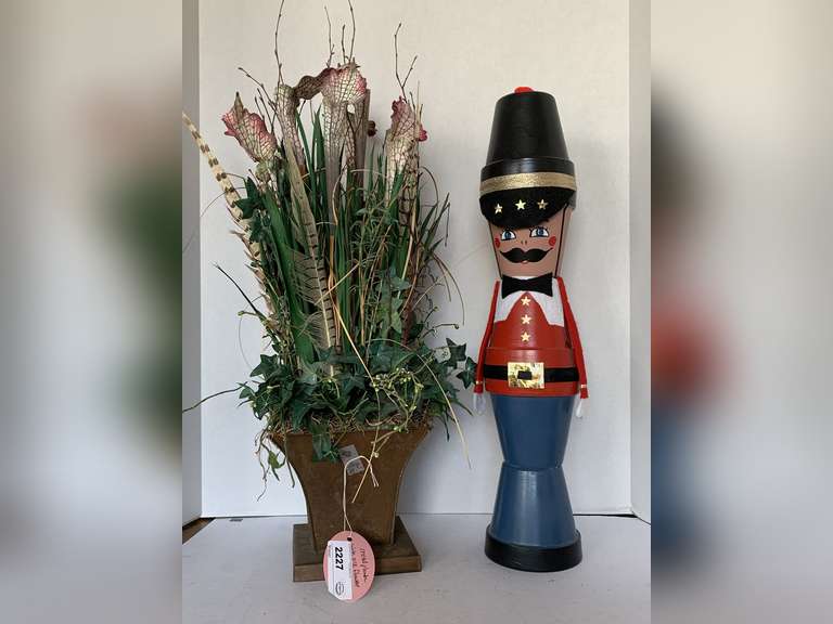 METAL PLANTER WITH FLORAL ARRANGEMENT 28" TALL & HANDMADE POTTERY TOY SOLDIER 22" TALL image