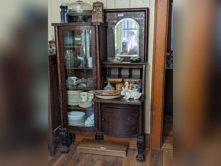 ANTIQUE CHINA CABINET WITH BOWED GLASS DOOR, PULL OUT SECRETARY SHELF, CLAW FEET ON CASTORS, AND MIRROR *** SPECIAL PICKUP INSTRUCTIONS *** image