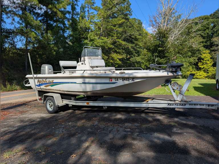 1997 PRO-LINE 180 SPORTSMAN CENTER CONSOLE BOAT WITH 4-STROKE HONDA 90, MINN KOTA 70LB THRUST POWER DRIVE 24V TROLLING MOTOR W/ WIRELESS REMOTE, HUMMINBIRD HELIX 7 FISH FINDER,  AND FAST LOAD DRIVE-ON TRAILER *** SPECIAL INSPECTION / PICKUP INSTRUCTIONS *** image