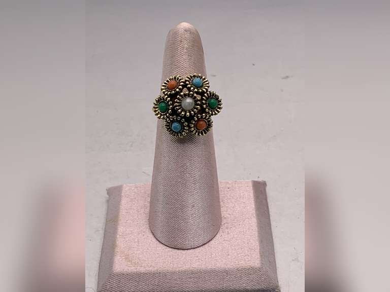 VINTAGE SARAH COVENTRY "BOUQUET" GOLD TONE RING WITH GLASS CABOCHONS IN A FLORAL MOTIF WITH A FROSTED WHITE STONE IN CENTER - EACH STONE IS SET INTO A GOLD FLUTED CUP SIZE 5 1/2 (ADJUSTABLE) image
