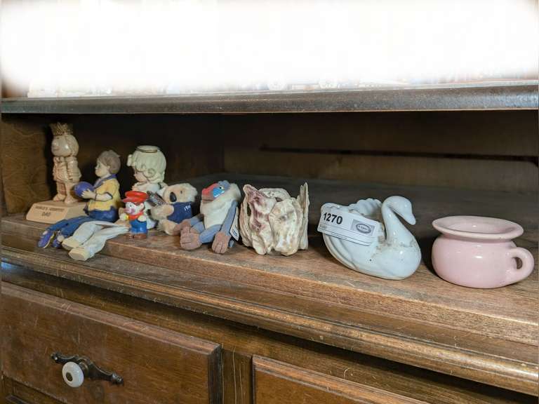 CANDLES, FIGURINES, MARIO, DISNEY, WORLD'S GREATEST DAD, AND MORE ON MIDDLE SHELF MARKED 1270 image