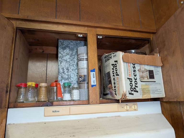 VINTAGE SYRUP, SHAKERS, EASY LINER, AND VINTAGE HAMILTON BEACH FOOD PROCESSOR WITH ORIGINAL BOX IN UPPER CABINET MARKED 1029 image
