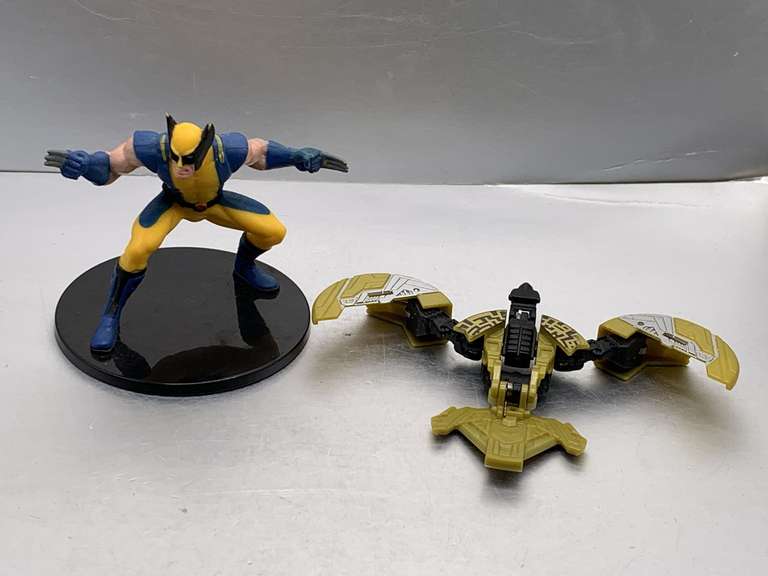 VINTAGE MARVEL WOLVERINE ON STAND & VOYAGER BUZZSAW TRANSFORMERS image