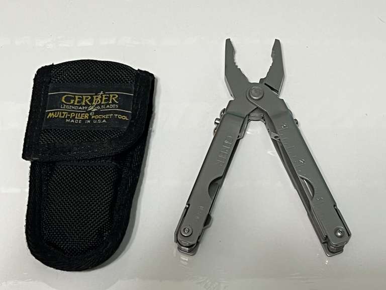 Gerber multitool, comes with belt sheath, see pictures for details. image
