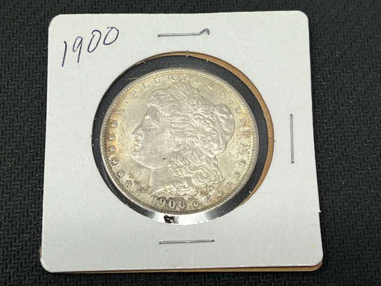 1900 Morgan silver dollar, see pictures for details. image