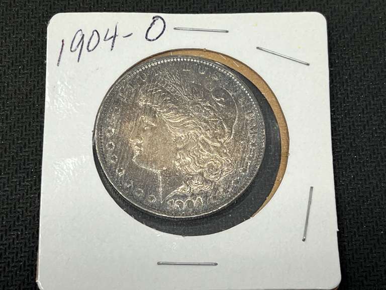 1904 – D Morgan silver dollar, see pictures for details. image