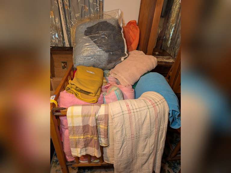 ALL BLANKETS IN BABY CRIB image
